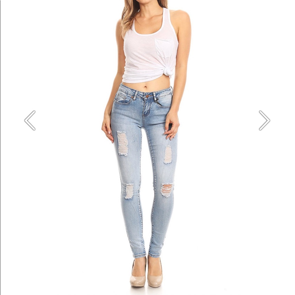 Light wash salvaje denim skinny distressed